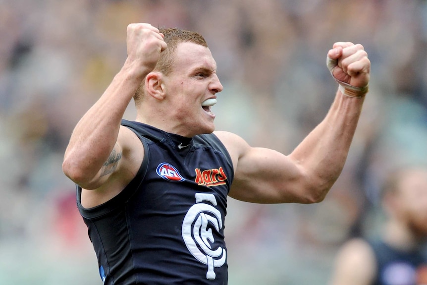 Robinson celebrates during Carlton win