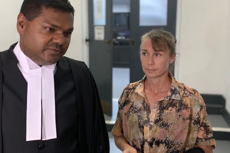 Yvette Nikolic's lawyer speaks to the media outside the court room in Suva, Fiji, after she was found not guilty.
