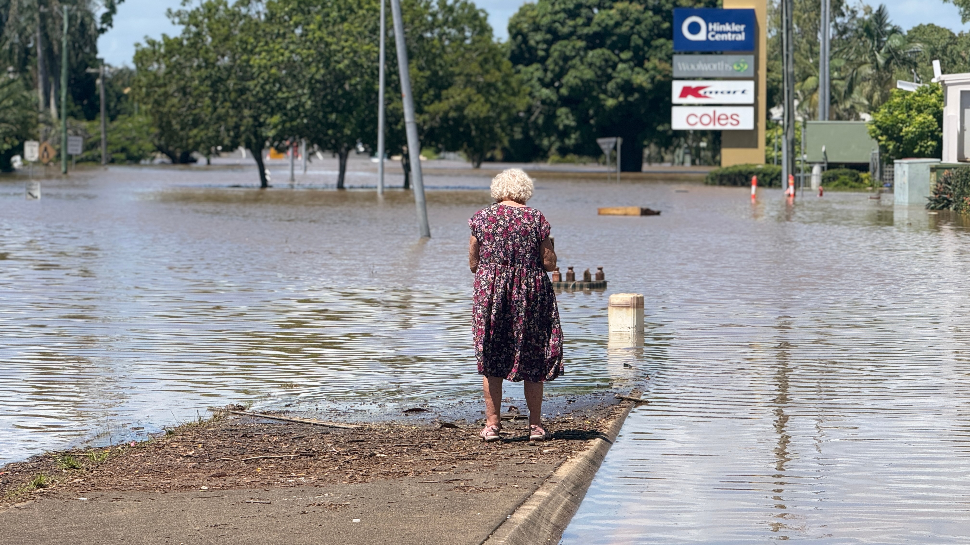woman at flooded street