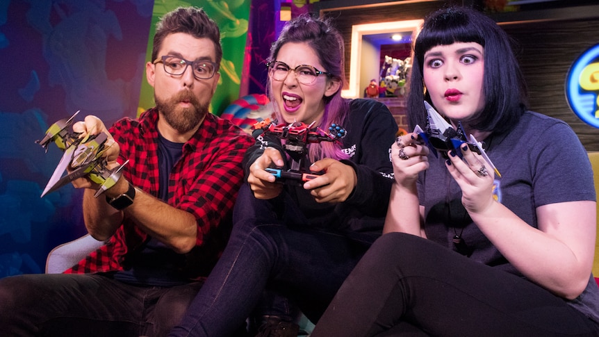 GGSP crew looking excited playing with Starlink toys