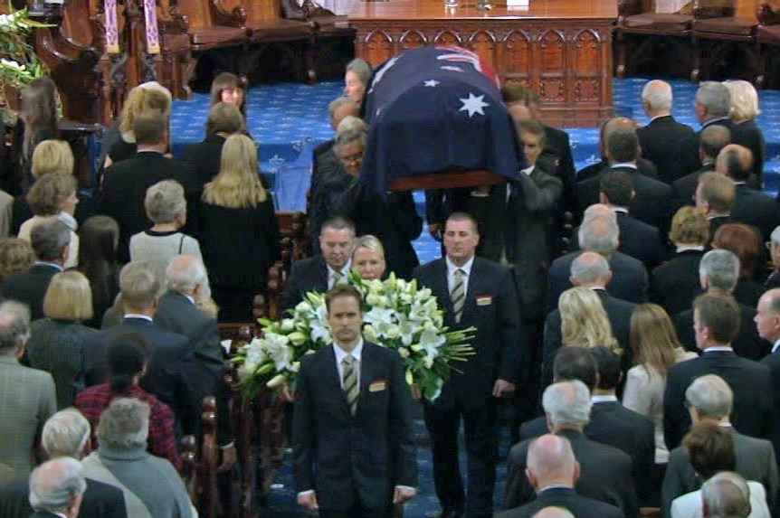 Malcolm Fraser's coffin is carried out of the state funeral