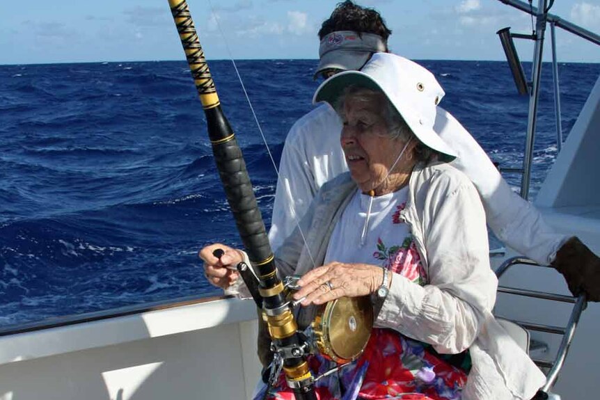 Connie Laurie reels in a marlin