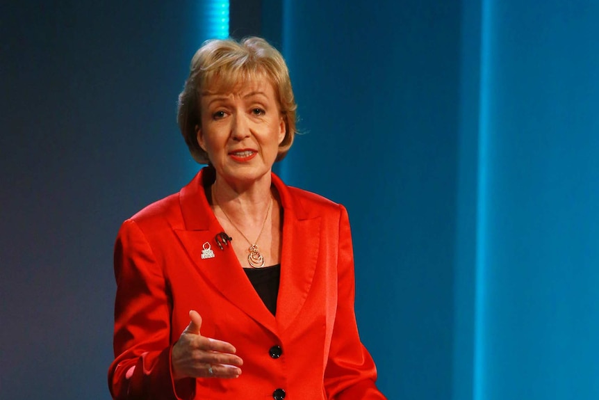 Andrea Leadsom speaks at a lectern.