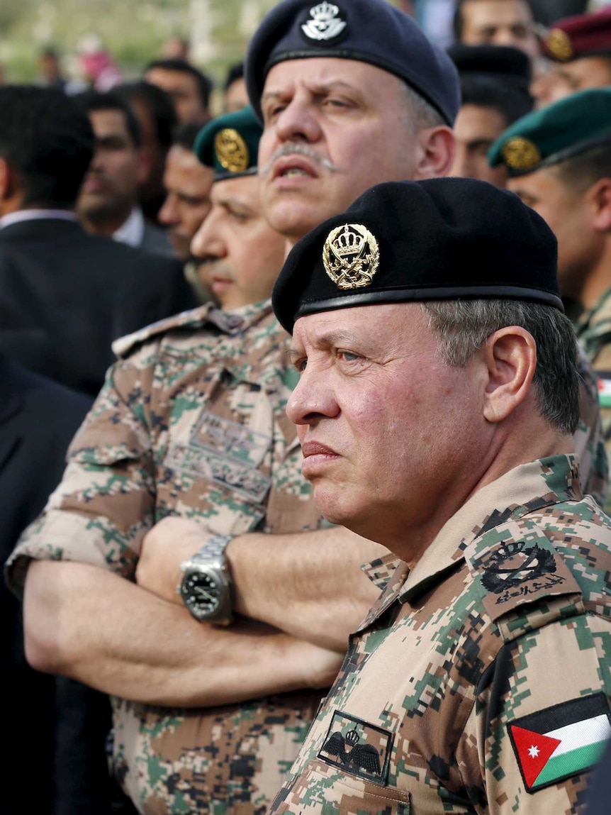 Jordan's King Abdullah and his brother Prince Faisal attend the funeral of Captain Rashed Zyoud.