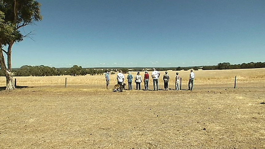 Residents stand at a proposed landfill site near York, east of Perth, that will take unrecyclable city trash.