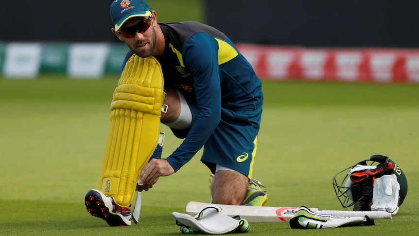 Batter getting ready for a cricket practice session.