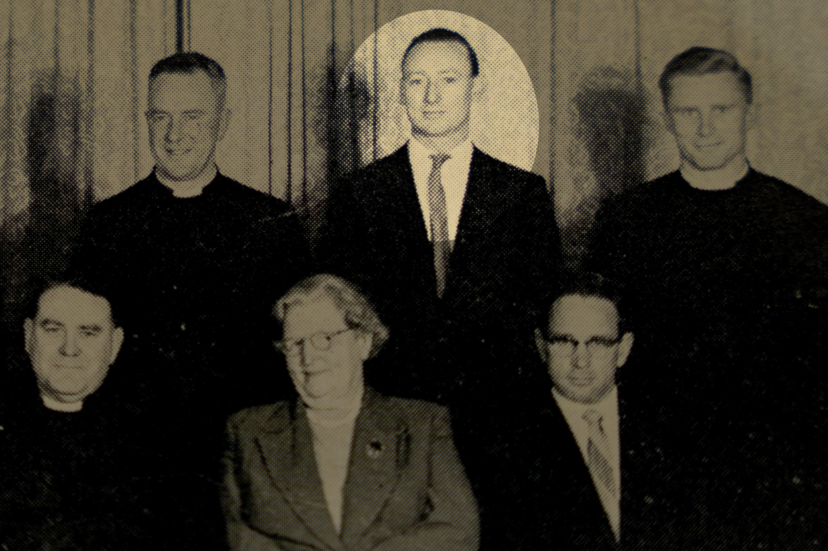 An old photo with one man highlighted.