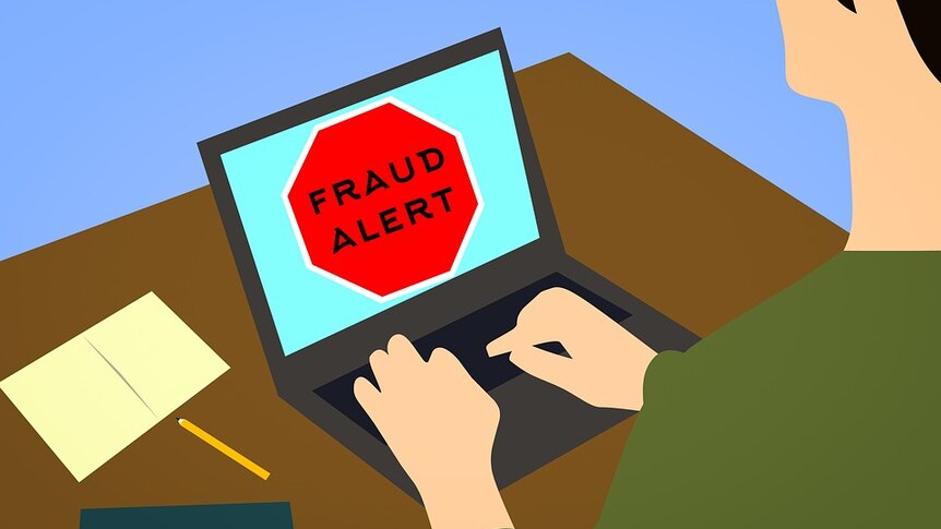 Animation of a laptop screen showing the words 'Fraud Alert'.