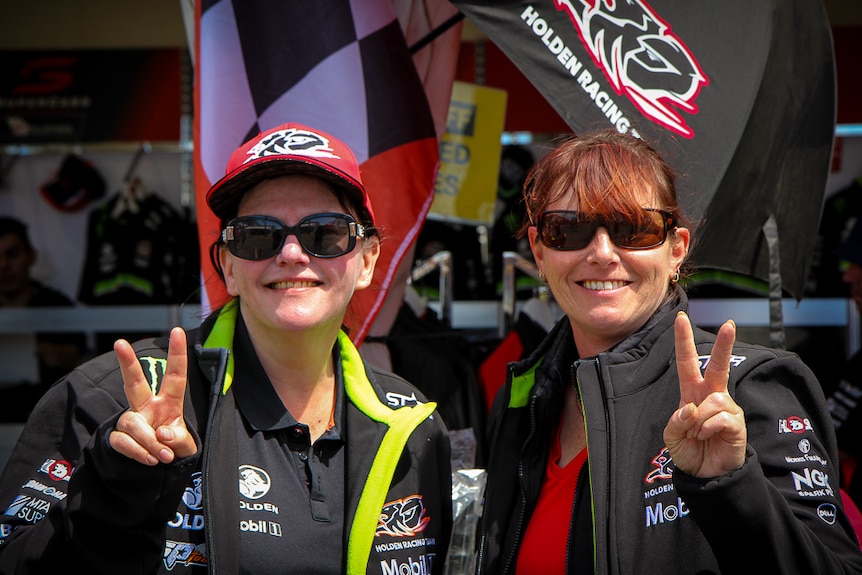 Two Holden fans in Holden merch at Bathurst 1000.