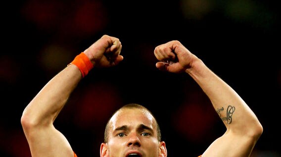 Wesley Sneijder celebrates the Netherlands' 3-2 victory.