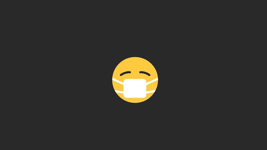 Face mask covered yellow emoji on black background.