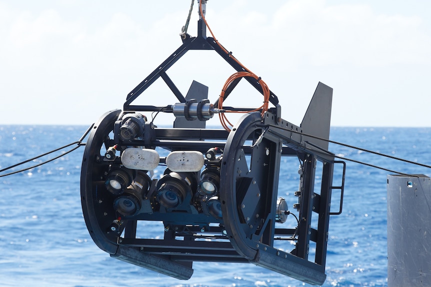 A scientific instrument with a camera that can be lowered into the water.