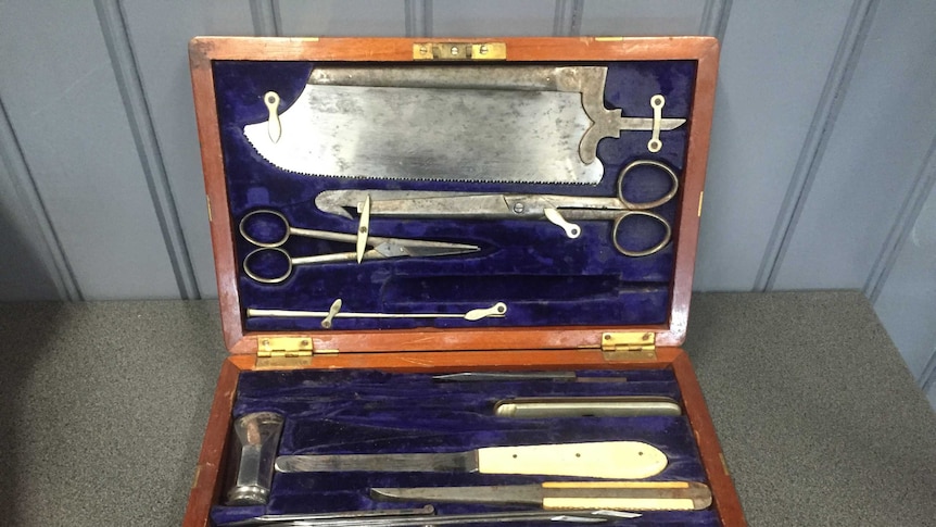 Surgical equipment from the 1850s used for amputations in a velvet-lined box.