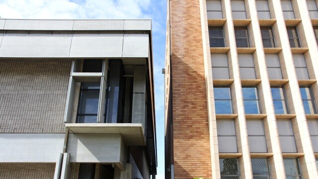 Newcastle lord mayor Jeff McCloy's plans to extend the art gallery (left) into the library (right) have been scrapped.