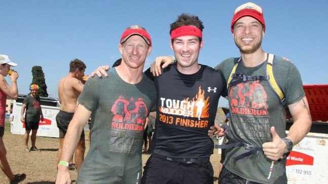 John Bale (C) competes in Tough Mudder race with Mark Donaldson VC (L) and Hamish Blake (R).