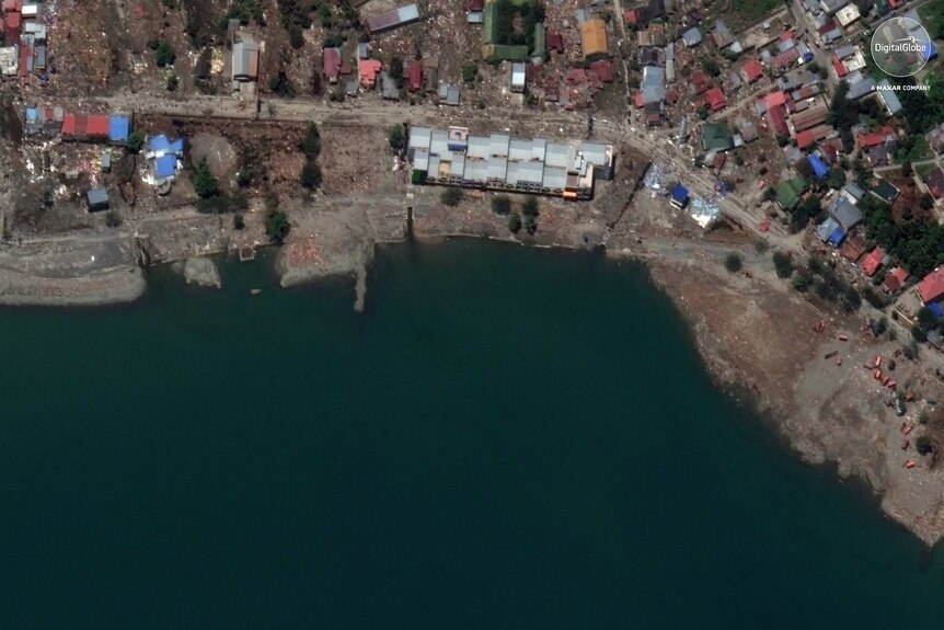 This October 1, 2018, satellite photo provided by DigitalGlobe shows a view of the Petobo neighborhood in Palu, Indonesia.