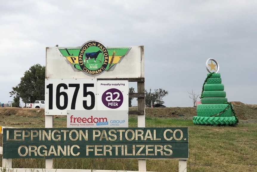 A sign stands at the front of a farm that reads Leppington Pastoral Company Organic Fertilizers