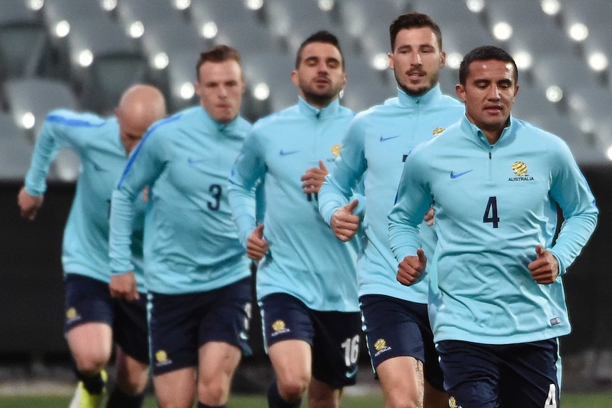Tim Cahill leads Socceroos training