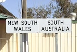 sign at the border between New South Wales and South Australia.