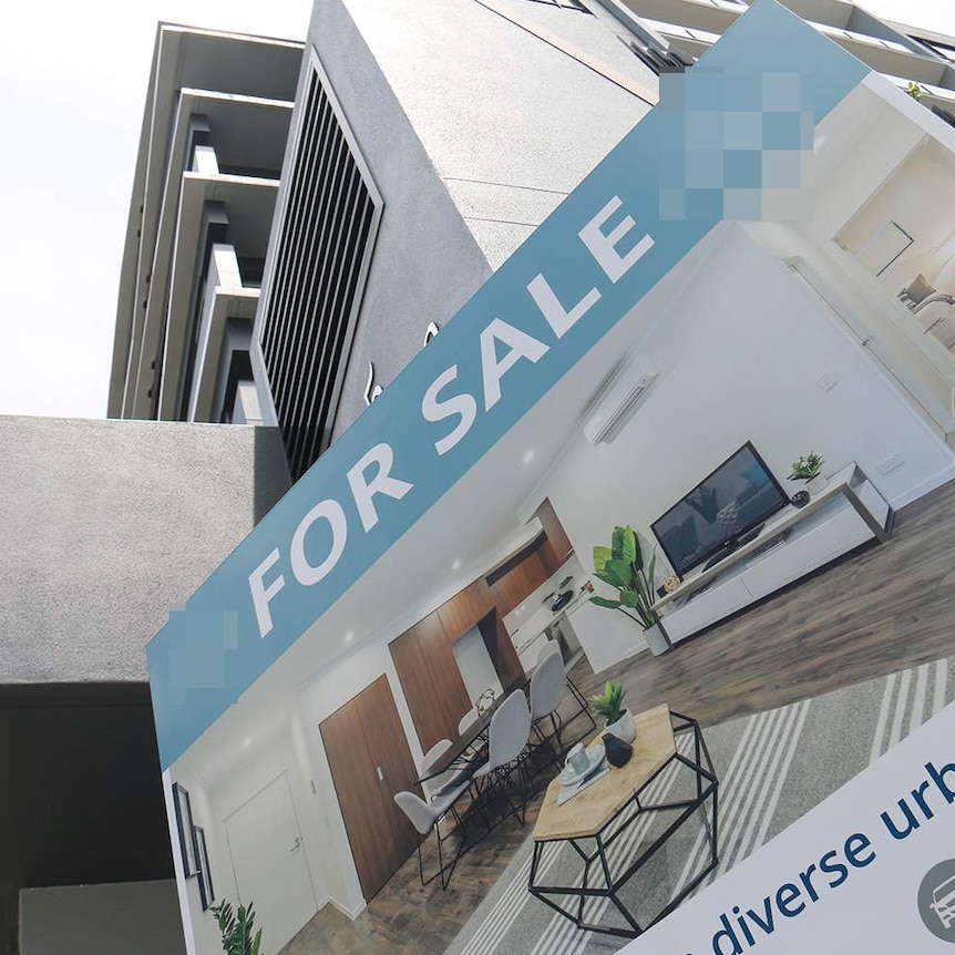 For sale sign outside an apartment building along a street in Brisbane on October 31, 2018.