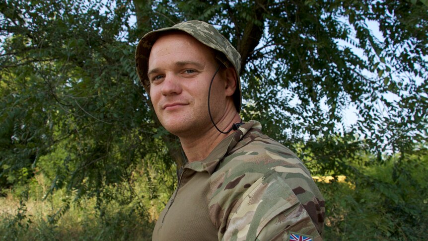 Igor Rulyak, a former businessman from Crimea, wears a British army uniform.