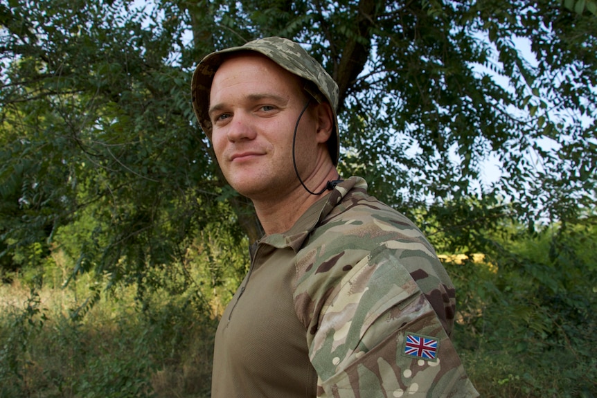 Igor Rulyak, a former businessman from Crimea, wears a British army uniform.