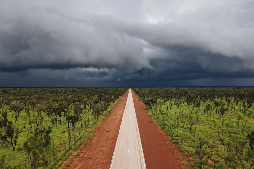 Storm clouds brew over Great Northern Highway between Broome and Derby.
