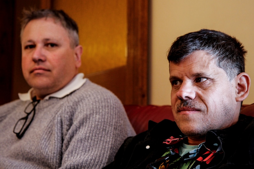 Mark and Adam James in Mark's outer suburban Melbourne home.