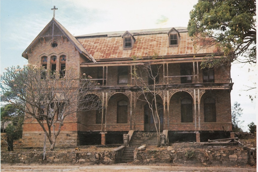 An 1880s convent stands in disrepair.