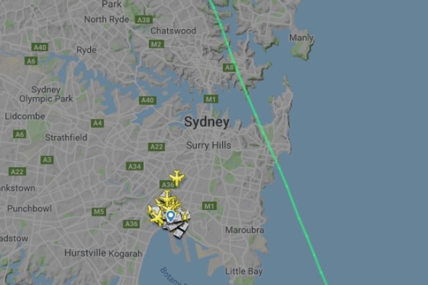 A map shows several planes on the tarmac at Sydney Airport.