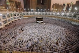 A wide view of lines of Muslims praying at the Grand mosque in Mecca.