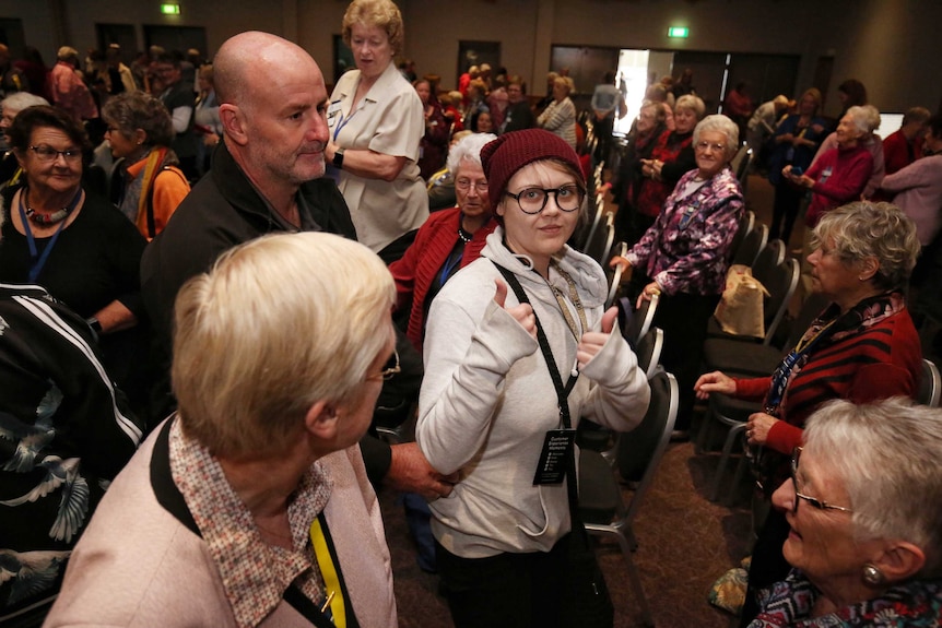 The person being escorted from the venue in Albury