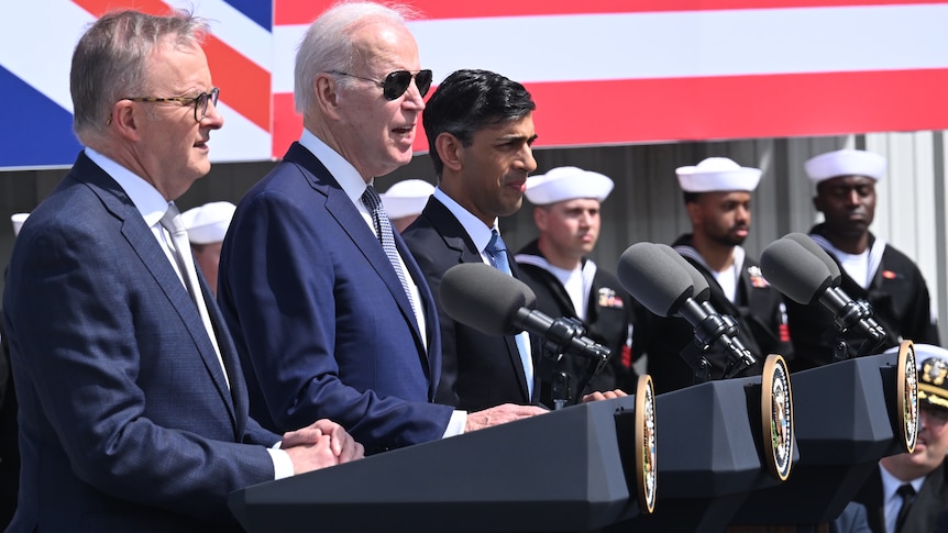 Anthony Albanese, Joe Biden and Rishi Sunak standing together at an AUKUS press conference