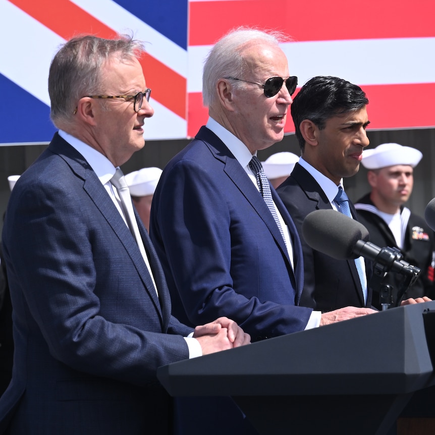 Anthony Albanese, Joe Biden and Rishi Sunak standing together at an AUKUS press conference