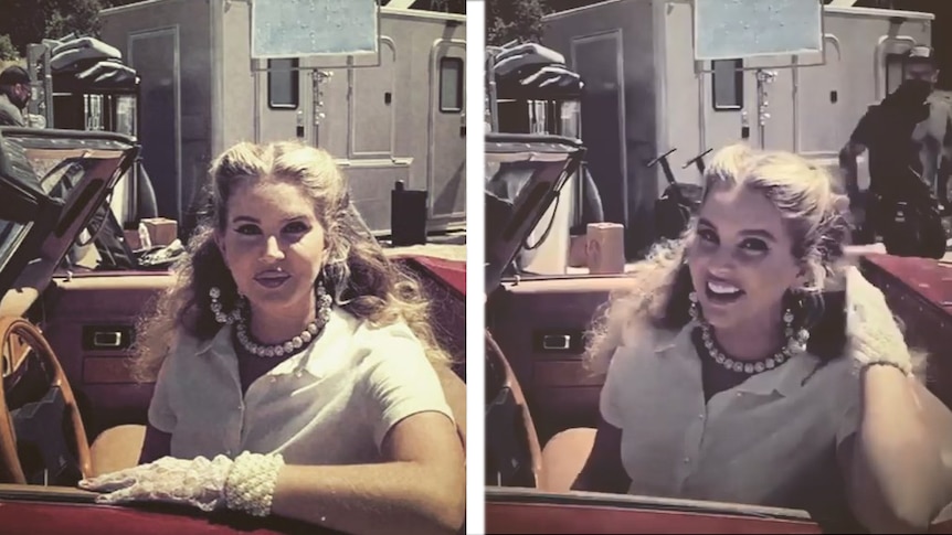 Lana Del Rey styled in a 1950s look in a vintage car on the set of a music video