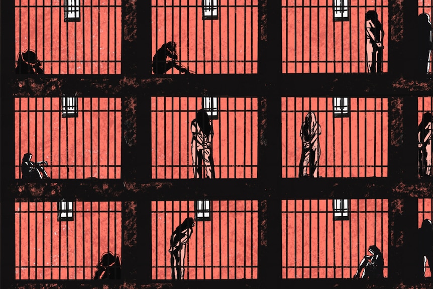An illustration shows three storeys of prison cells filled with women.