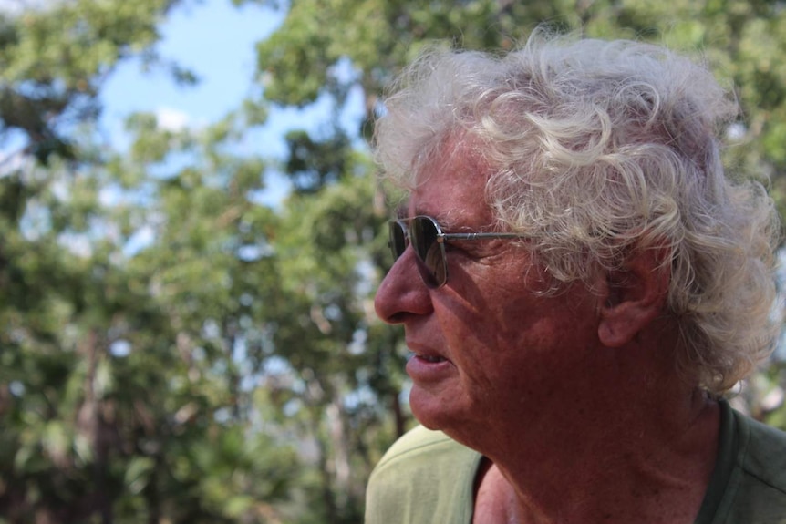 Property owner Richard Luxton peering out to the bush.