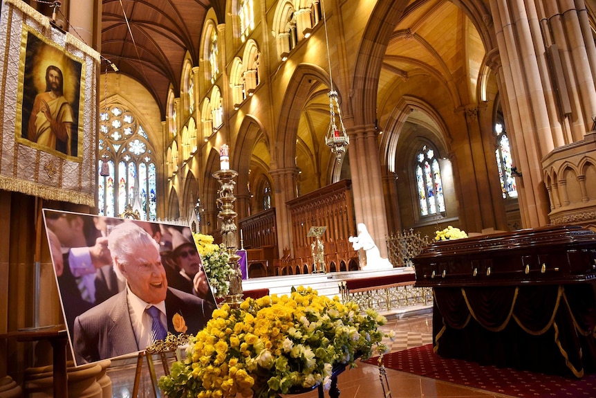 The casket of Bart Cummings lies in St Mary's Cathedral, Sydney, ahead of his state funeral.
