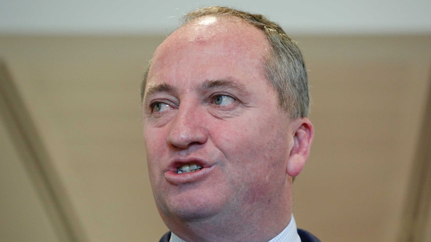 A close-up of Barnaby Joyce speaking, his mouth mid-word