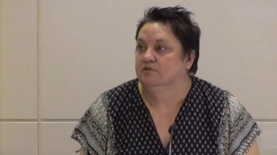 An image of Tracey Walsh on the stand at the royal commission