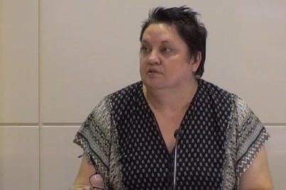 An image of Tracey Walsh on the stand at the royal commission