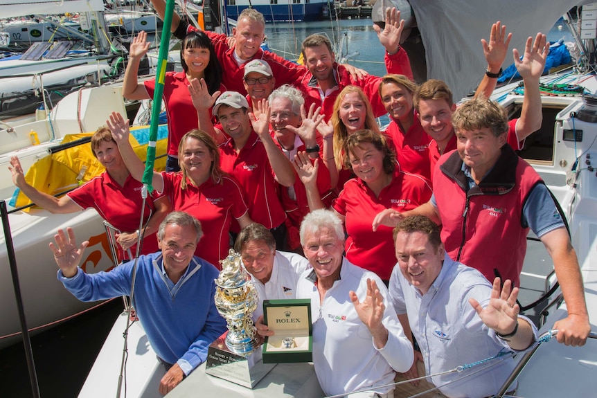 The crew of Wild Rose, 2014 handicap winner of the Sydney to Hobart Yacht Race