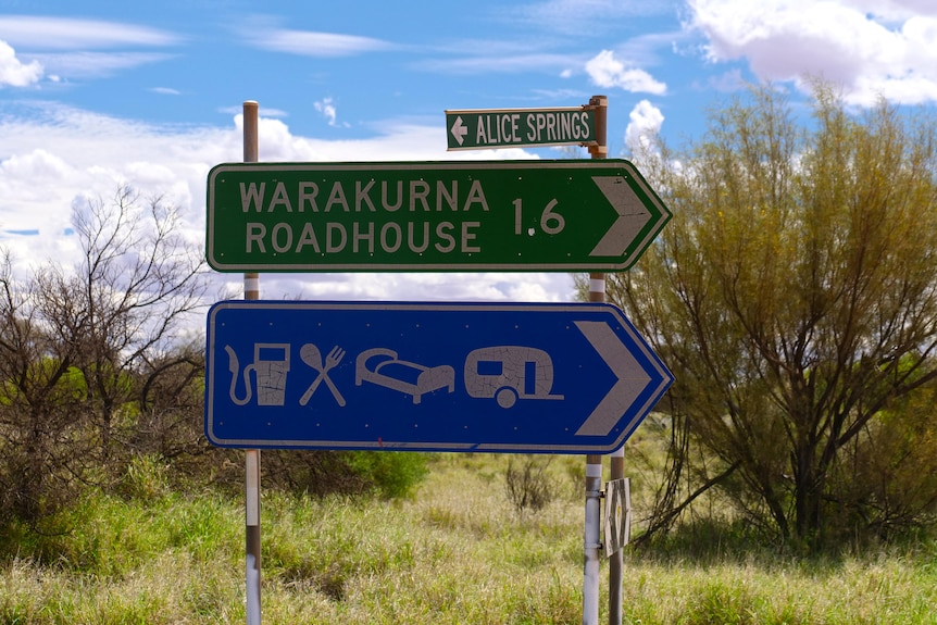 A road sign leading to Warakurna community.