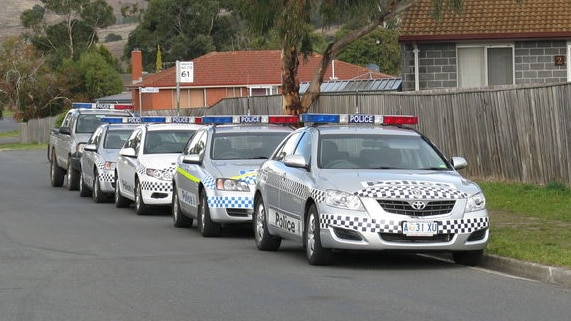 Police cars lined up in the Hobart suburb of Rokeby