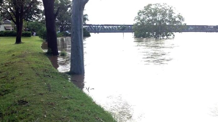 The Clarence River comes close to breaking over the levee.