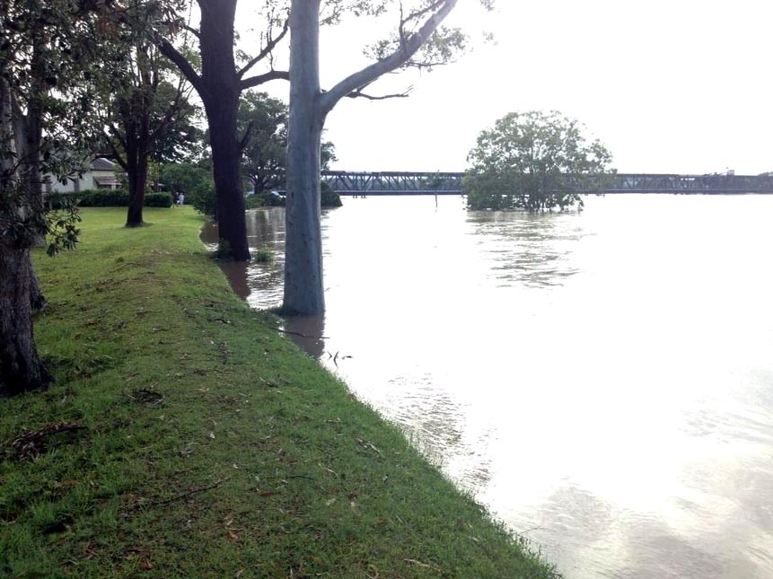 The Clarence River comes close to breaking over the levee.
