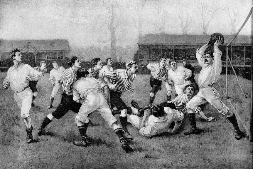 An illustration of a men's football match in the 19th century, one man is about to throw the ball