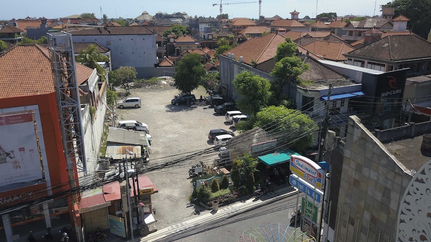 A vacant lot between buildings