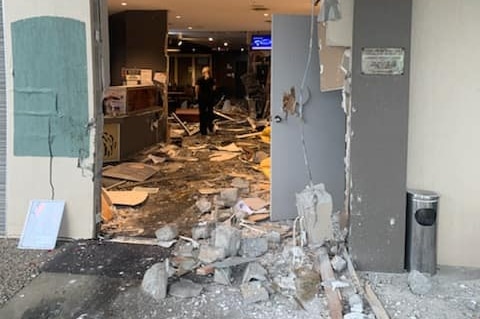 A foyer of a club covered in debris