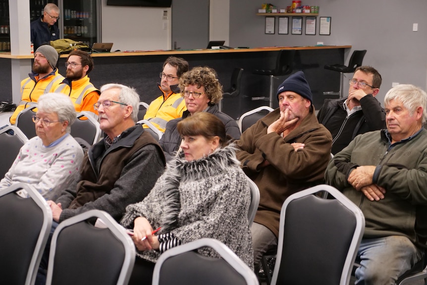 A group of residents sit in chairs at a public meeting in Kaniva, Victoria